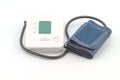 Automatic digital blood pressure monitoring meter on white background Royalty Free Stock Photo