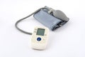 Automatic digital blood pressure monitoring meter on white background Royalty Free Stock Photo