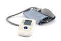 Automatic digital blood pressure monitoring meter on white background Royalty Free Stock Photo