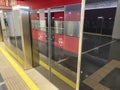 Automatic door platform system at a new modern metro station. Metro security system glass beautiful doors open synchronously with Royalty Free Stock Photo