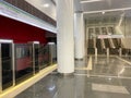 Automatic door platform system at a new modern metro station. Metro security system glass beautiful doors open synchronously with Royalty Free Stock Photo