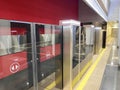 Automatic door platform system at a new modern metro station. Metro security system glass beautiful doors open synchronously with Royalty Free Stock Photo