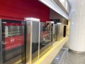 Automatic door platform system at a new modern metro station. Metro security system glass beautiful doors open synchronously with Royalty Free Stock Photo