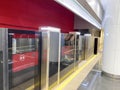 Automatic door platform system at a new modern metro station. Metro security system glass beautiful doors open synchronously with Royalty Free Stock Photo