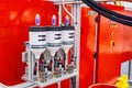 Automatic dosing, mixing and pouring unit for hot curing three-component polyurethane elastomers