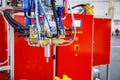 Automatic dosing, mixing and pouring unit for hot curing three-component polyurethane elastomers