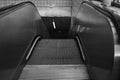 Automatic escalator in the subway. Mechanical escalator in the international airport or modern subway train station Royalty Free Stock Photo