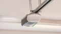 Automatic Garage Door Opener Motor on the Ceiling. Close Up. Royalty Free Stock Photo