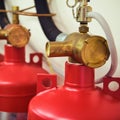 Automatic gas fire extinguishing system consisting of two red cylinders Royalty Free Stock Photo