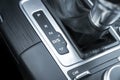 Automatic gear stick of a modern car. Modern car interior details. Close up view. Car inside. Automatic transmission lever shift. Royalty Free Stock Photo