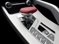 Automatic gear stick of a modern car. Modern car interior details. Close up view. Car inside. Automatic transmission lever shift. Royalty Free Stock Photo