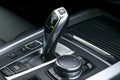 Automatic gear stick transmission of a modern car, multimedia and navigation control buttons. Car interior details. Transmission Royalty Free Stock Photo