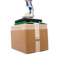 Automatic hand hold robot manipulator with cardboard box Royalty Free Stock Photo