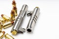 Automatic handgun barrels and .45 bullets on white background , Semi wadcutter bullets