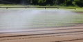 Automatic irrigation system on the cultivated field to give water to the cultivation during drought