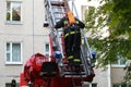 Automatic ladder of fire engine to a burning house