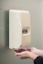 Automatic liquid soap dispenser on wall Royalty Free Stock Photo