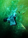 Automatic pistol launched in the water Royalty Free Stock Photo
