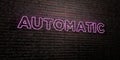 AUTOMATIC -Realistic Neon Sign on Brick Wall background - 3D rendered royalty free stock image