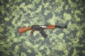 Russian automatic rifle lies on camouflage background Royalty Free Stock Photo