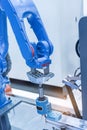 Automatic robot in assembly line working in factory Royalty Free Stock Photo