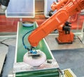 Automatic robot in assembly line working in factory Royalty Free Stock Photo