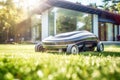 Automatic robotic lawn mower on a green lawn with modern house in background at sunny day