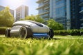 Automatic robotic lawn mower moving on green lawn near modern residential apartment building houses. Automated smart