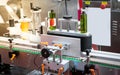 Automatic round bottle labelling machine sticker Royalty Free Stock Photo