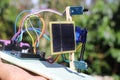 Automatic solar tracking prototype project with solar panel and infrared light sensors controlled by a microcontroller in the Royalty Free Stock Photo