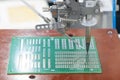 The automatic soldering robot operation with PCB board
