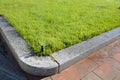 Automatic Sprinkler head spraying water over green grass. Royalty Free Stock Photo