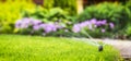 Automatic sprinkler system watering the lawn Royalty Free Stock Photo