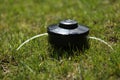 automatic sprinkler system watering the lawn on a background of green grass, close up Royalty Free Stock Photo