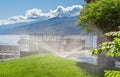 Automatic sprinklers watering grass. Garden Watering Systems. Irrigation System Watering the green grass Royalty Free Stock Photo