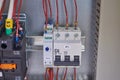 Automatic switch, phase control relay and contactor in the electrical Cabinet