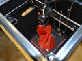 Automatic three dimensional 3d printer performs plastic. Royalty Free Stock Photo