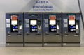 The automatic train ticket vendor machines stand alone