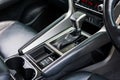 automatic transmission shift selector in the car interior. Closeup a manual shift of modern car gear shifter. 4x4 gear shift Royalty Free Stock Photo