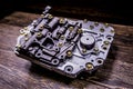 Automatic transmission valve body on wooden background Royalty Free Stock Photo