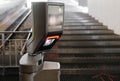 Automatic turnstile gate for entry and exit with tickets checking.