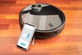 Automatic vacuum cleaner robot to clean the floor and help in housework controlled by an smart phone with an app