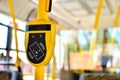 Automatic validator for reading and scanning ticket, cards and bank cards in public transport to pay for riding. Wireless Royalty Free Stock Photo