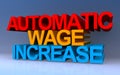 Automatic wage increase on blue Royalty Free Stock Photo