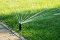 Automatic watering lawns Royalty Free Stock Photo