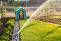 Automatic watering system for new fresh lawn Royalty Free Stock Photo