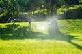 Automatic watering system and water sprayed from the sprinkler for lawn, grass