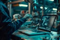 Automation engineer programming robotic arm with laptop in factory. Manufacturing industry concept