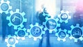 Automation technology and smart industry concept on blurred abstract background. Gears and icons