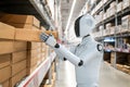 Automation warehouse with assistant robot work in warehouse